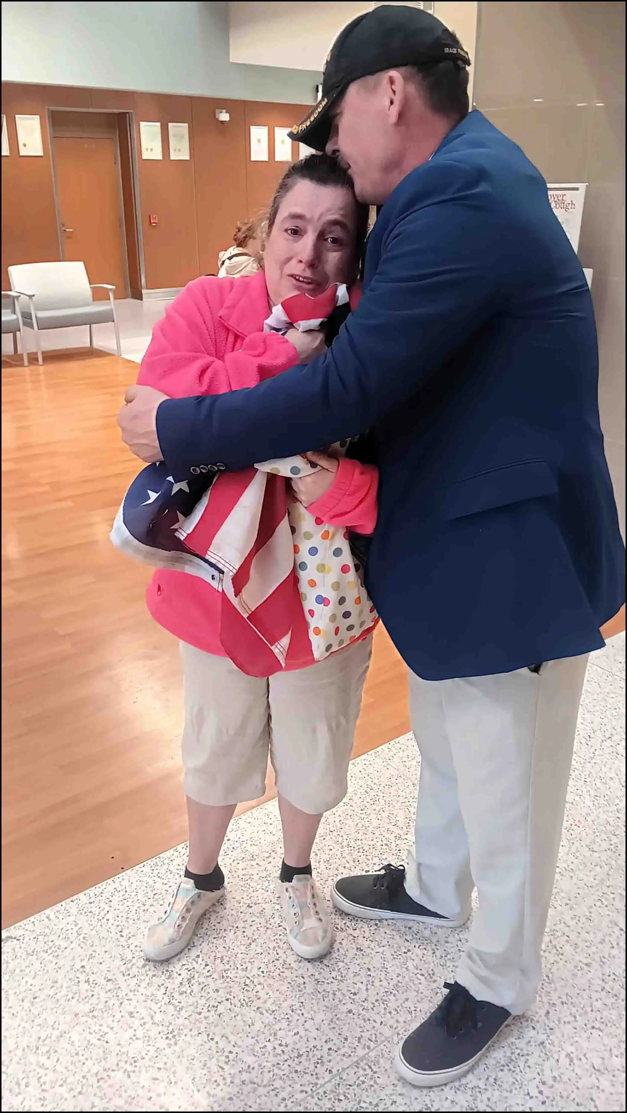 Veteran David Haave gives his American flag for the loss of her father -- David Haave